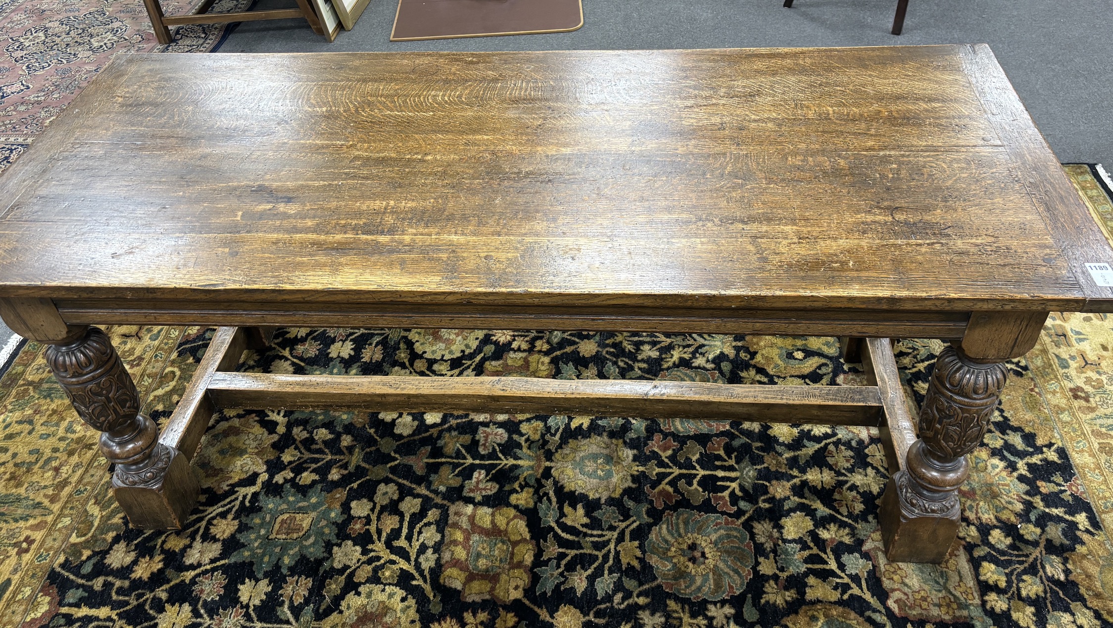 An early 20th century Jacobean revival rectangular oak refectory dining table, length 182cm, width 77cm, height 75cm